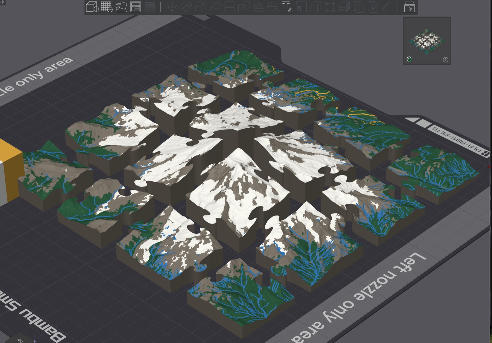Mount Rainier color terrain puzzle separated into 16 pieces in Bambu Studio